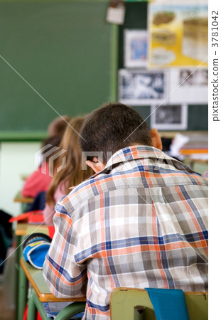 kids in a primary school classroom kids in a primary school classroom 3781042