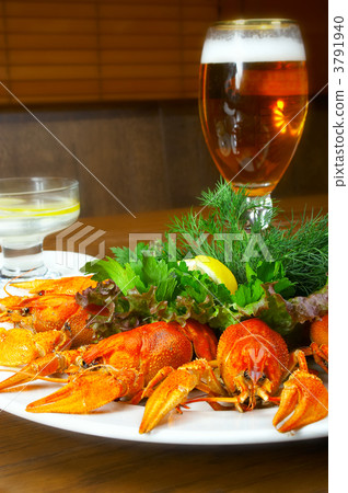 Crayfishs with beer on a table at restaurant Crayfishs with beer on a table at restaurant 3791940