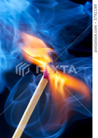 Photo of a burning match in a smoke on a black background Photo of a burning match in a smoke on a black background 3792199