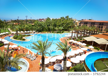 People on rest near swimming pool People on rest near swimming pool 3792244