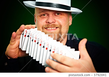 man skilfully shuffles playing cards man skilfully shuffles playing cards 3792841