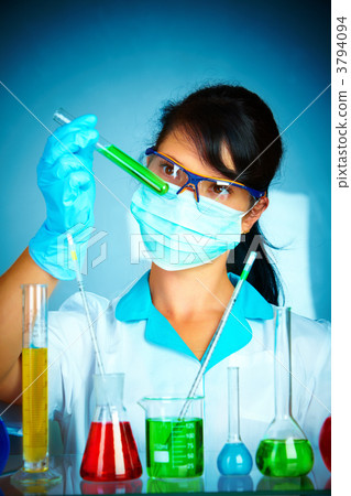 scientist in laboratory with test tubes 3794094