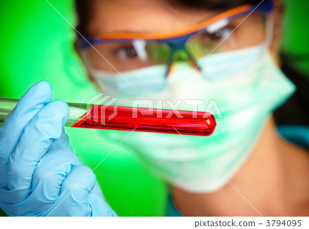 scientist in laboratory with test tubes scientist in laboratory with test tubes 3794095