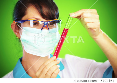 scientist in laboratory with test tubes 3794164