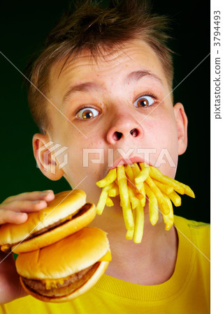 child and fast food. child and fast food. 3794493