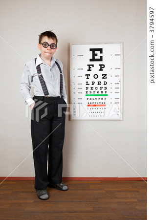 person wearing spectacles in an office at the doctor 3794597