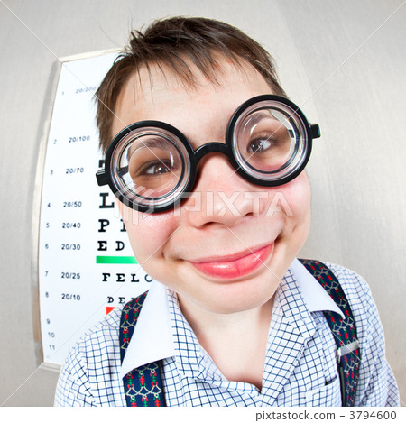 person wearing spectacles in an office at the doctor 3794600