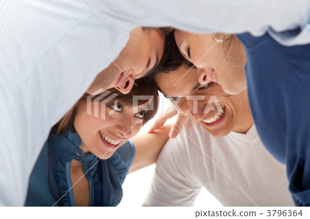 Group of people with heads together Group of people with heads together 3796364