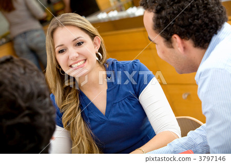 Woman talking with friends Woman talking with friends 3797146