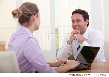 Business couple with laptop Business couple with laptop 3797907