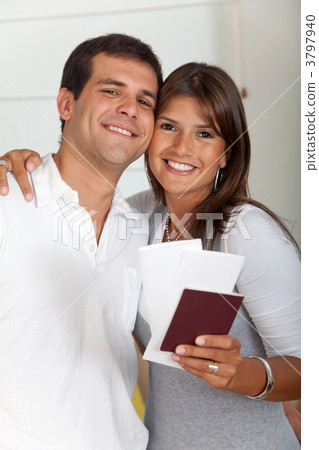 Travelling couple with passports 3797940