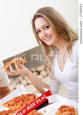 Woman eating pizza 3798983