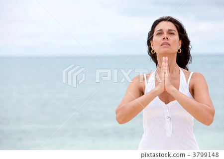 Woman doing yoga outdoors 3799148