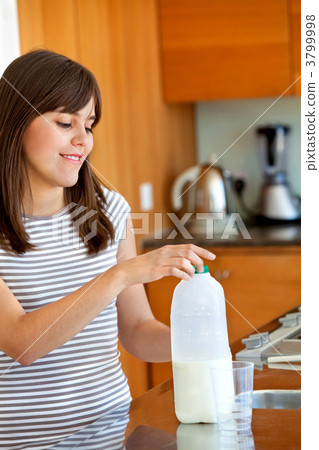 Young woman with milk 3799998