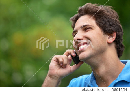 Man outdoors on the phone Man outdoors on the phone 3801554