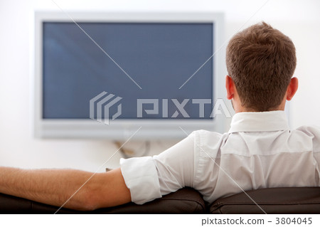 man and plasma tv 3804045