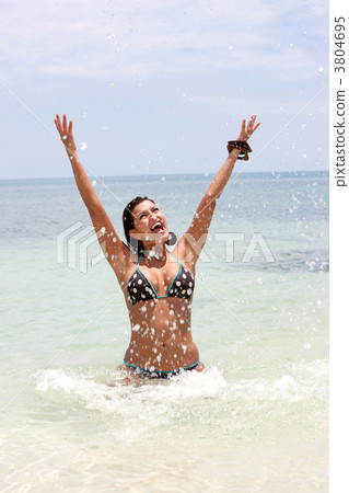 Beach woman splashing 3804695