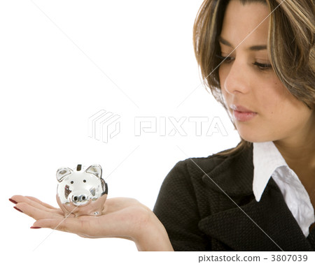 woman looking at a piggy bank woman looking at a piggy bank 3807039