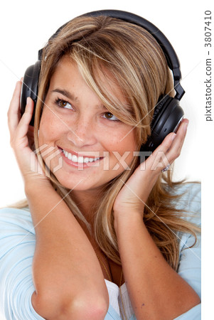 Woman listening to music Woman listening to music 3807410