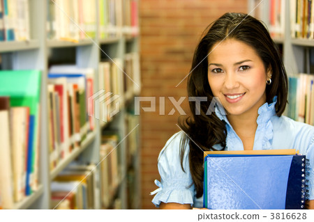 student in a library 3816628