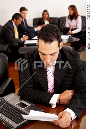 business people in an office business people in an office 3819302