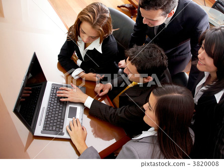 business team in an office laptop 3820008
