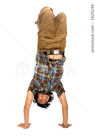 casual guy doing a handstand casual guy doing a handstand 3820246