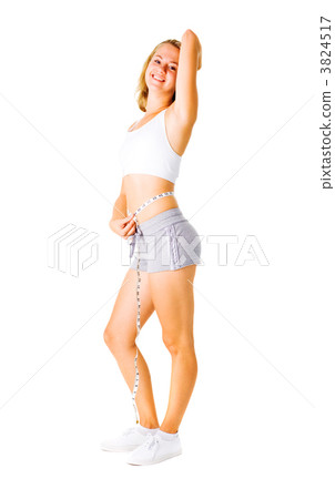 Young Woman Measuring Herself On White Young Woman Measuring Herself On White 3824517