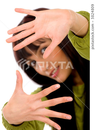 Beautiful girl framing the photo 3824809