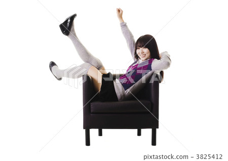 Excited Chinese student in a leather chair. 3825412