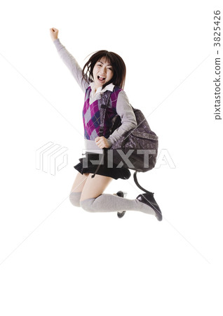 Chinese school girl jumping into air. 3825426