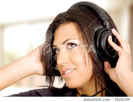 girl listening to music at home girl listening to music at home 3826294
