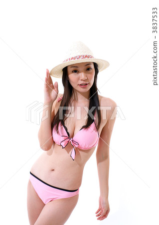A young woman in a bathing suit 3837533