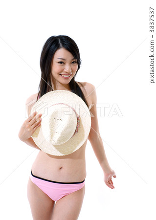 A young woman in a bathing suit 3837537