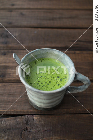Hot matcha latte in a Japanese mug 3838386