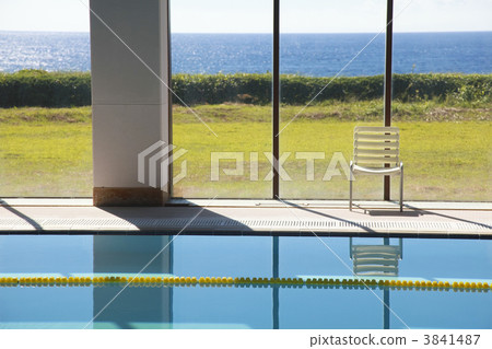 Indoor swimming pool with glass facing the sea Indoor swimming pool with glass facing the sea 3841487