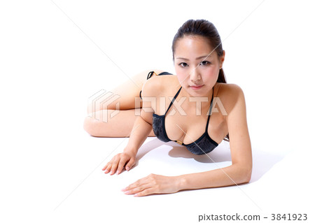 A young woman in a bathing suit 3841923