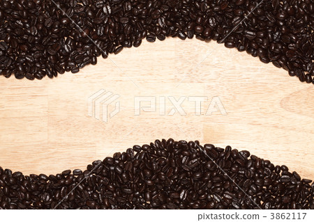 Dark Roasted Coffee Beans on Wood Background Dark Roasted Coffee Beans on Wood Background 3862117