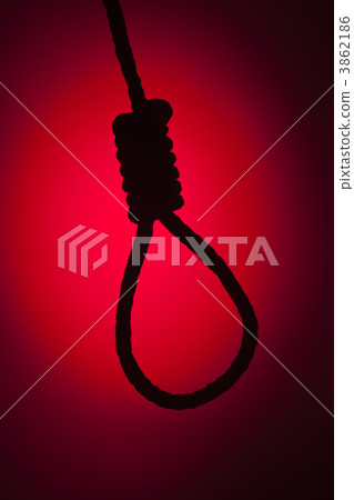 Silhouetted Hangman's Noose Over Red Background Silhouetted Hangman's Noose Over Red Background 3862186