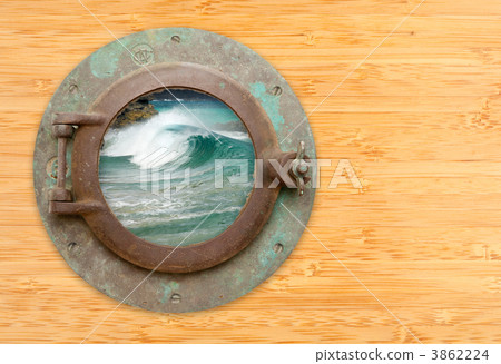 Antique Porthole with View of Crashing Waves on a Bamboo Wall Ba Antique Porthole with View of Crashing Waves on a Bamboo Wall Ba 3862224