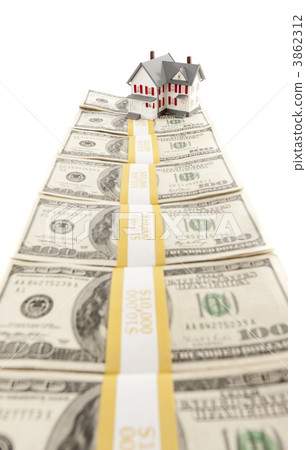 Small House on Row of Hundred Dollar Bill Stacks Small House on Row of Hundred Dollar Bill Stacks 3862312