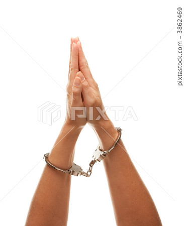 Handcuffed Woman Raising Hands in Air on White Handcuffed Woman Raising Hands in Air on White 3862469
