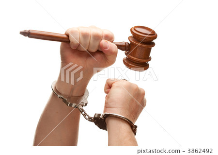 Handcuffed Man Holding Wooden Gavel on White Handcuffed Man Holding Wooden Gavel on White 3862492