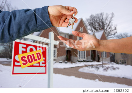 Handing Over the House Keys in Front of New Home Handing Over the House Keys in Front of New Home 3862802