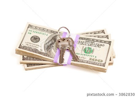 House Keys on Stack of Money Isolated House Keys on Stack of Money Isolated 3862830