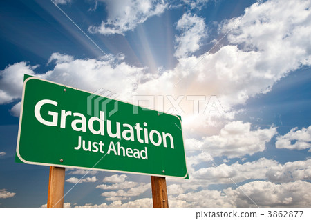 Graduation Green Road Sign Over Clouds Graduation Green Road Sign Over Clouds 3862877