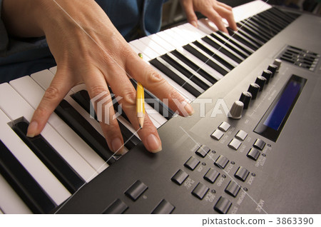 Woman's Fingers on Digital Piano Keys Woman's Fingers on Digital Piano Keys 3863390