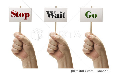 Three Signs In Fists Saying Stop, Wait and Go Three Signs In Fists Saying Stop, Wait and Go 3863542