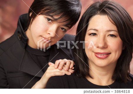 Attractive Multiethnic Mother and Daughters Portrait 3864818