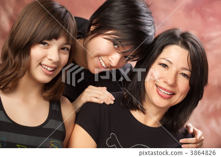 Attractive Multiethnic Mother and Daughters Portrait 3864826